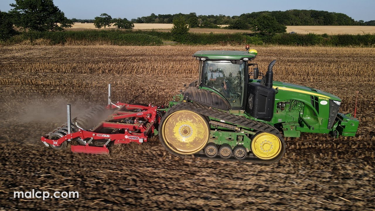 John Deere 8370 RT ripping OSR stubble with a Sumo Trio 3.5 cultivator in Suffolk