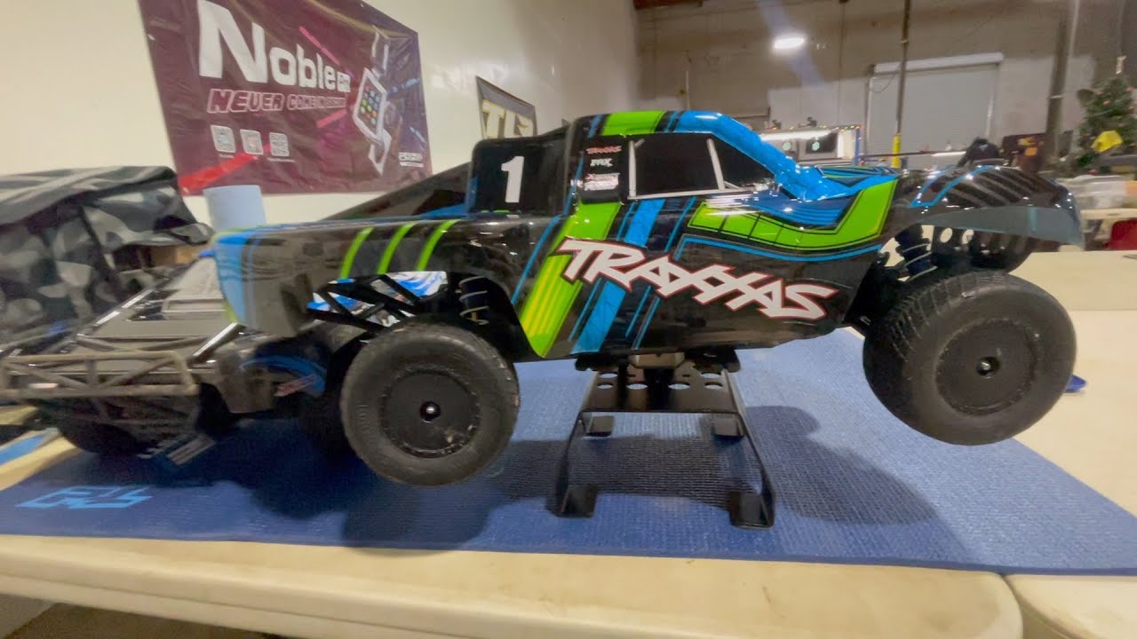 Traxxas Slash Racing On A Clay Track