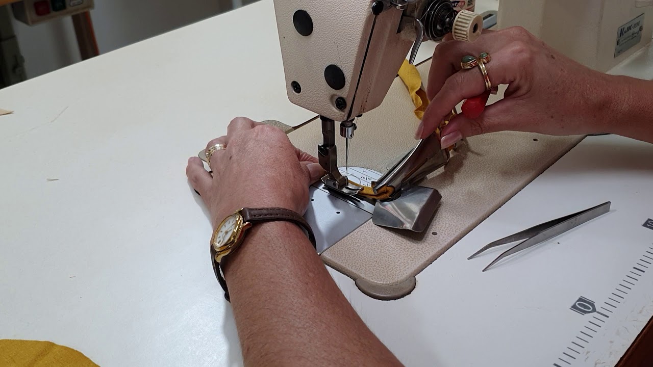 Como usar aparelho de viés na maquina reta.