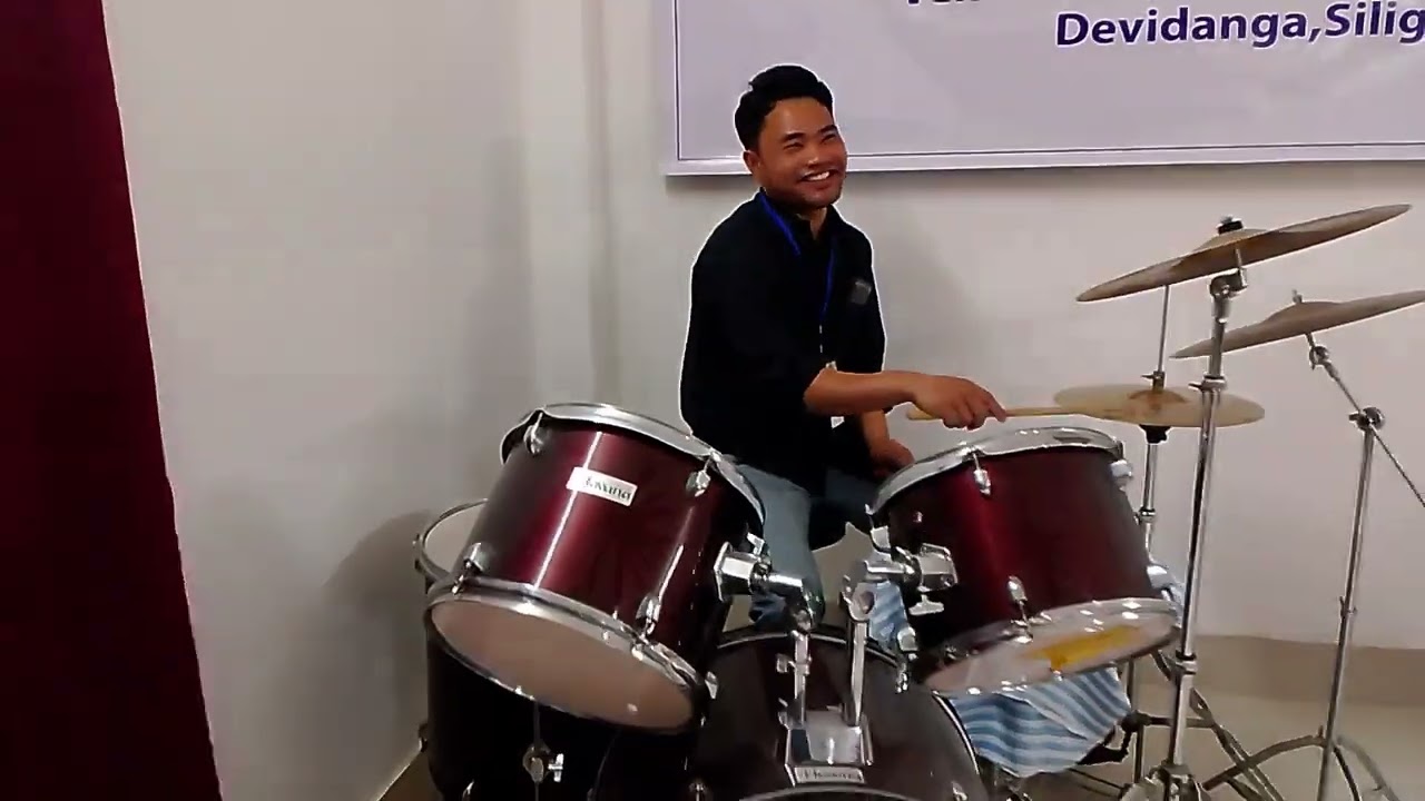 Bro Gobin sunar Nepali Silong Jesus Christ Church Pastor singing on Seminar Program siliguri 