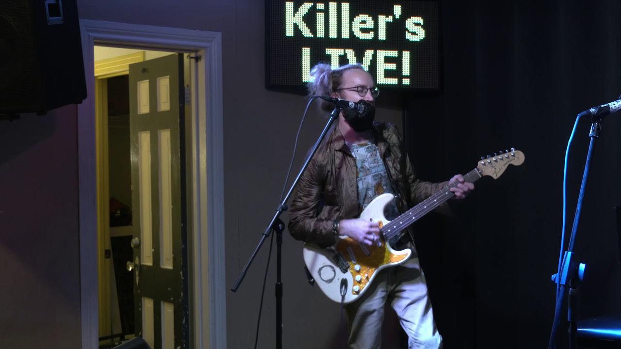 Kenny Cohen performs at Killer's Tacos Open Mic Night