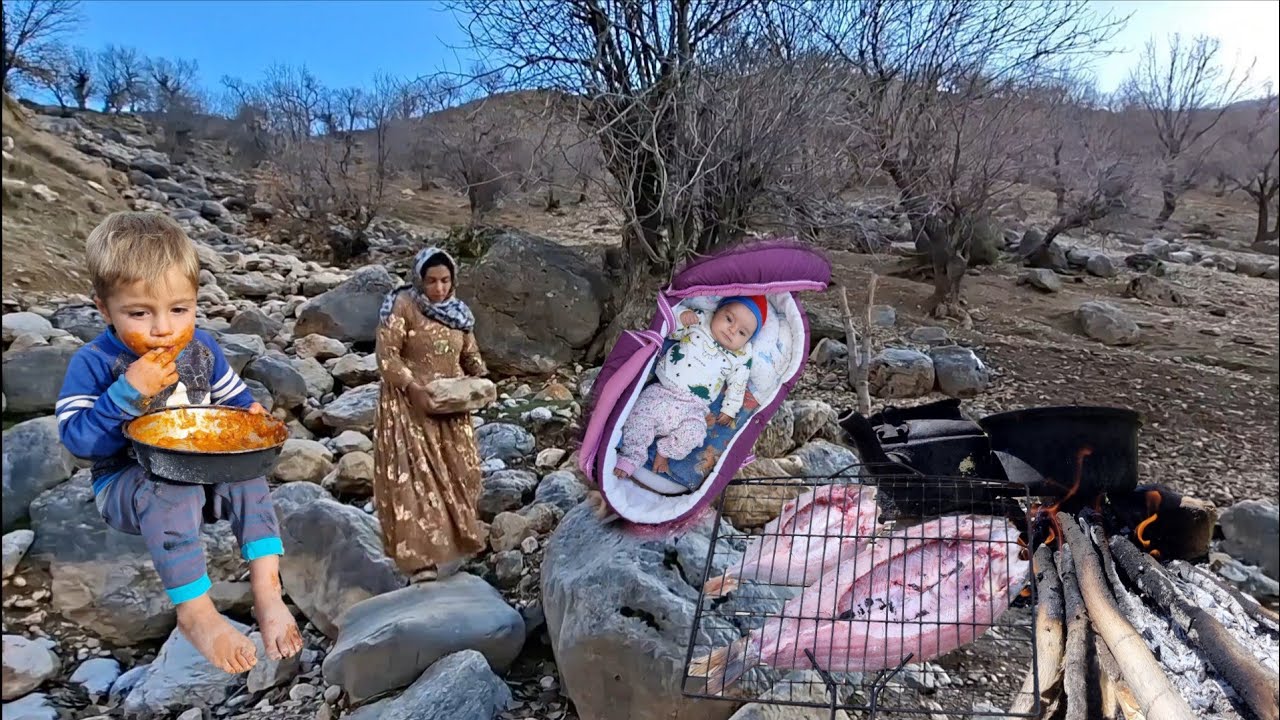 Nomadic Woman Fishing and Cooking with Her Two Children by a Mountain River