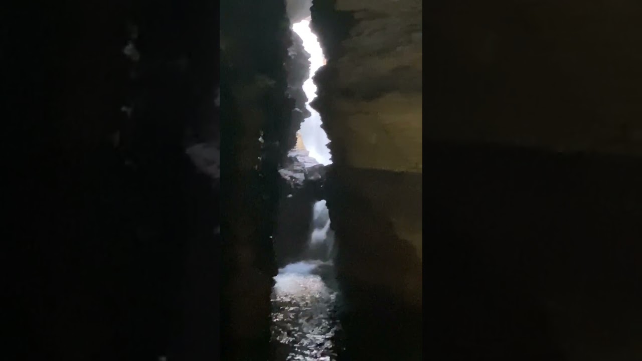Davis falls inside the cave.