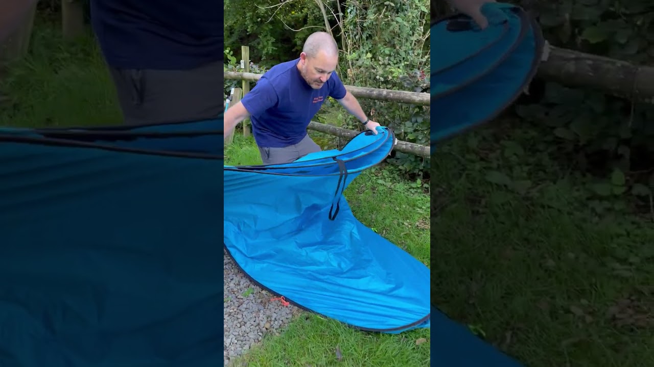 Folding a pop up shower tent