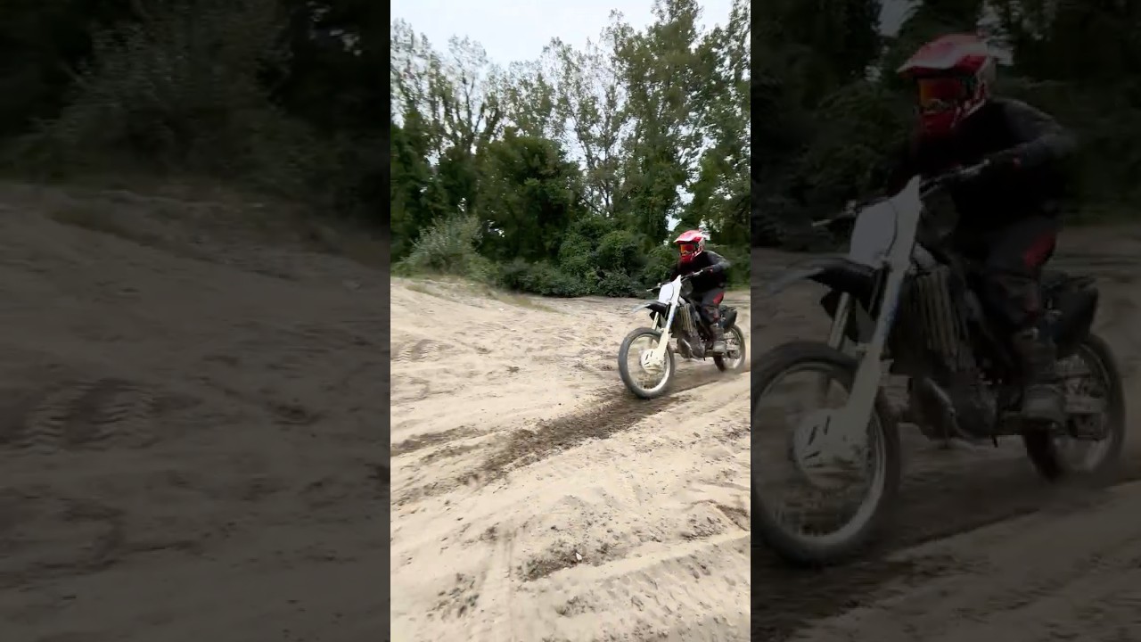Attempting the local sand whoops wide open on the 05 CRF 250R 