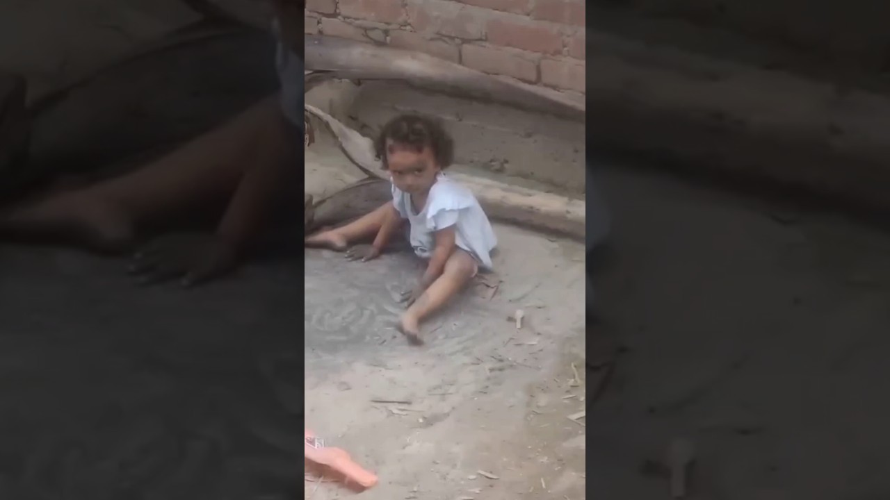 Naughty kid playing with sand #shorts #trending #trendingshorts #ytshort #playing #viralvideo