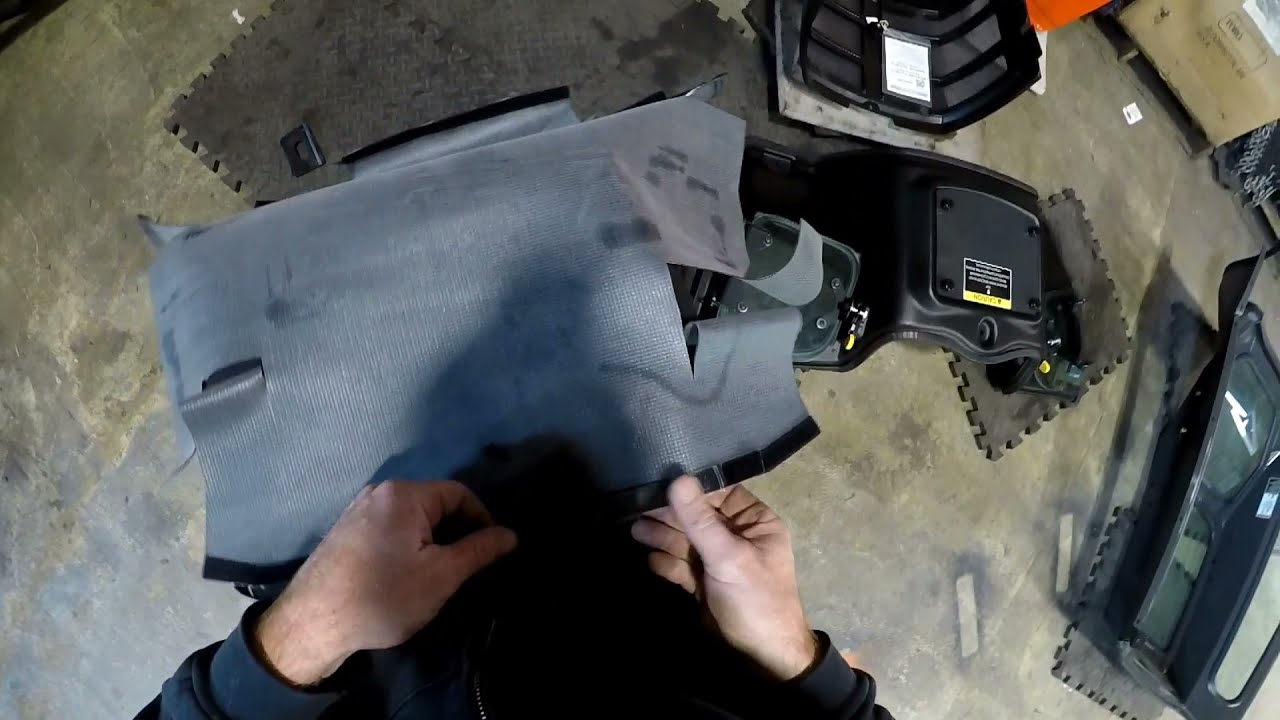 working on a curtis cab  / Kubota bx2380