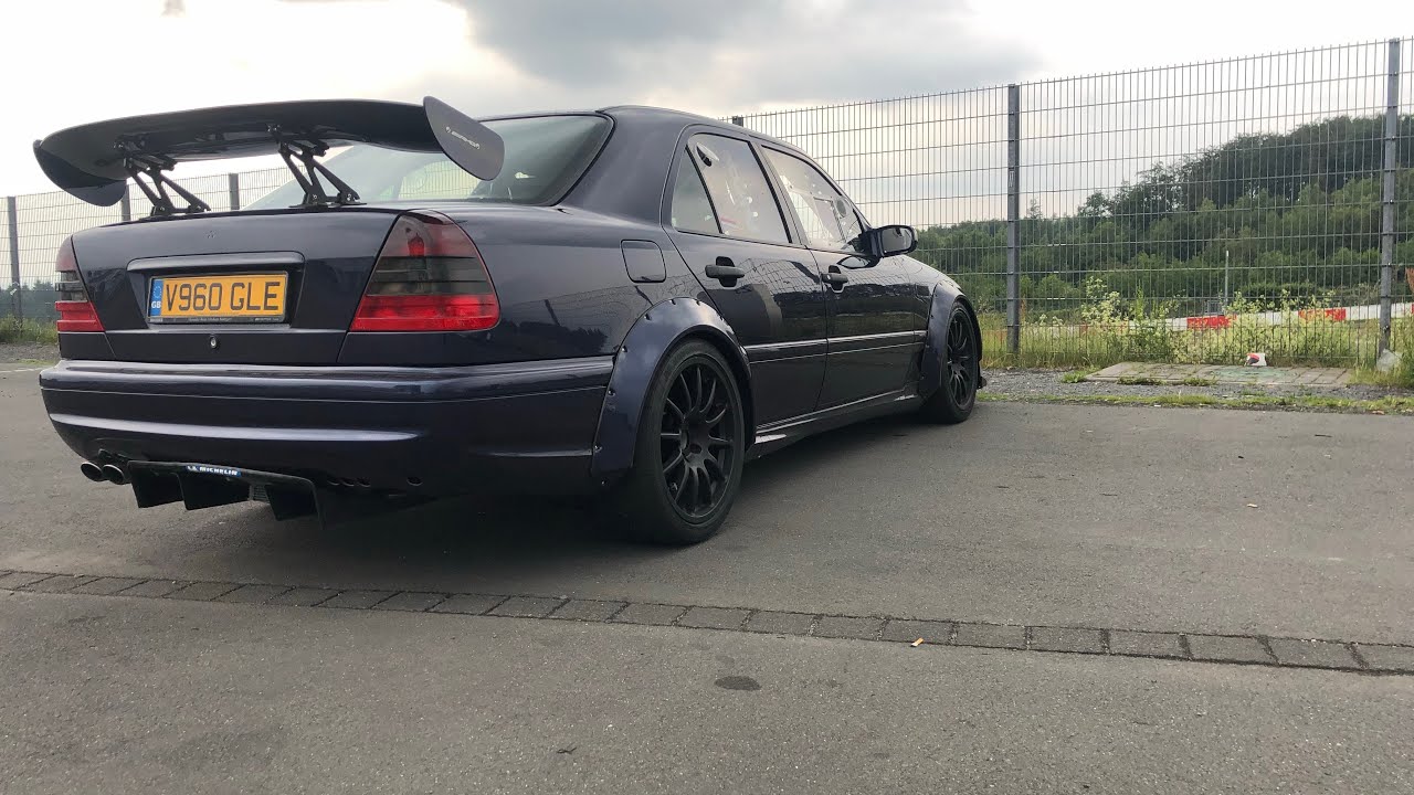 Track car aerodynamics underbody flat floor installation and exhaust relocation