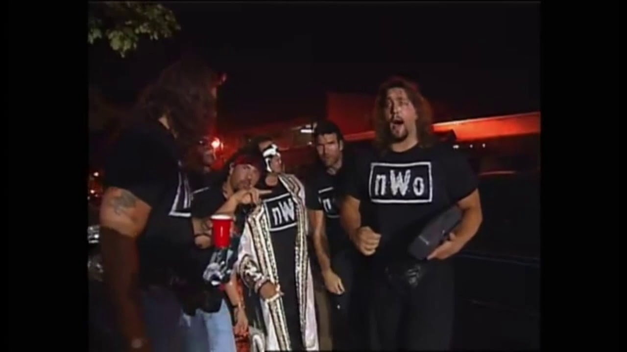 NWO  - Hollywood Hulk Hogan Kevin Nash Scott Hall Syxx Ted Dibaise and the whole NWO arrives