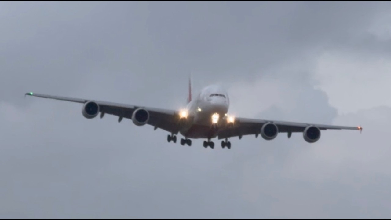 5+ min of big planes landing in 30+ kts storm plus epic night landing and cool photos