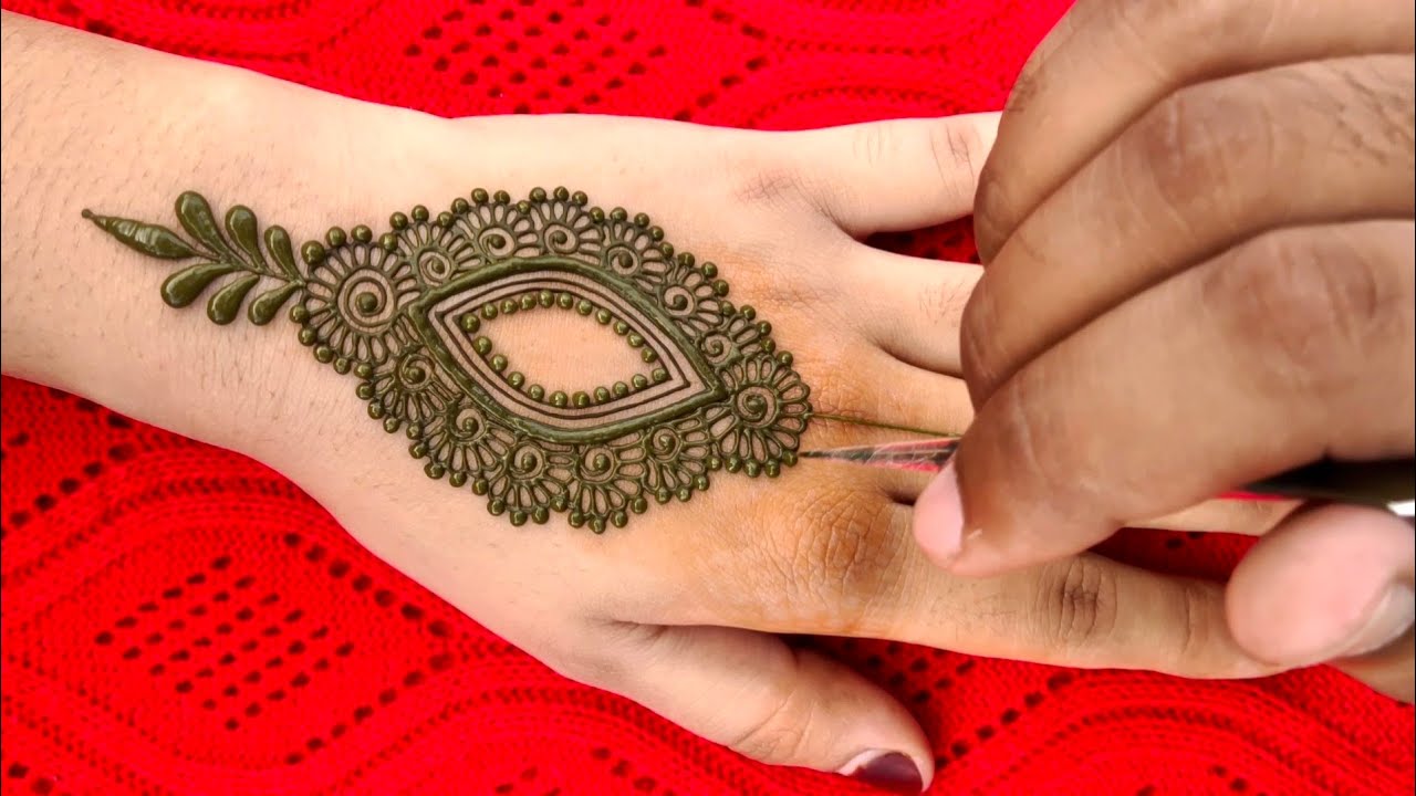 girlish mehndi design for back side and fingers GJMEHENDIDESIGNE