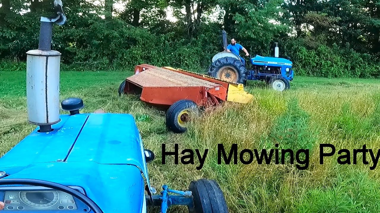 Two New Holland Haybines Going in Circles