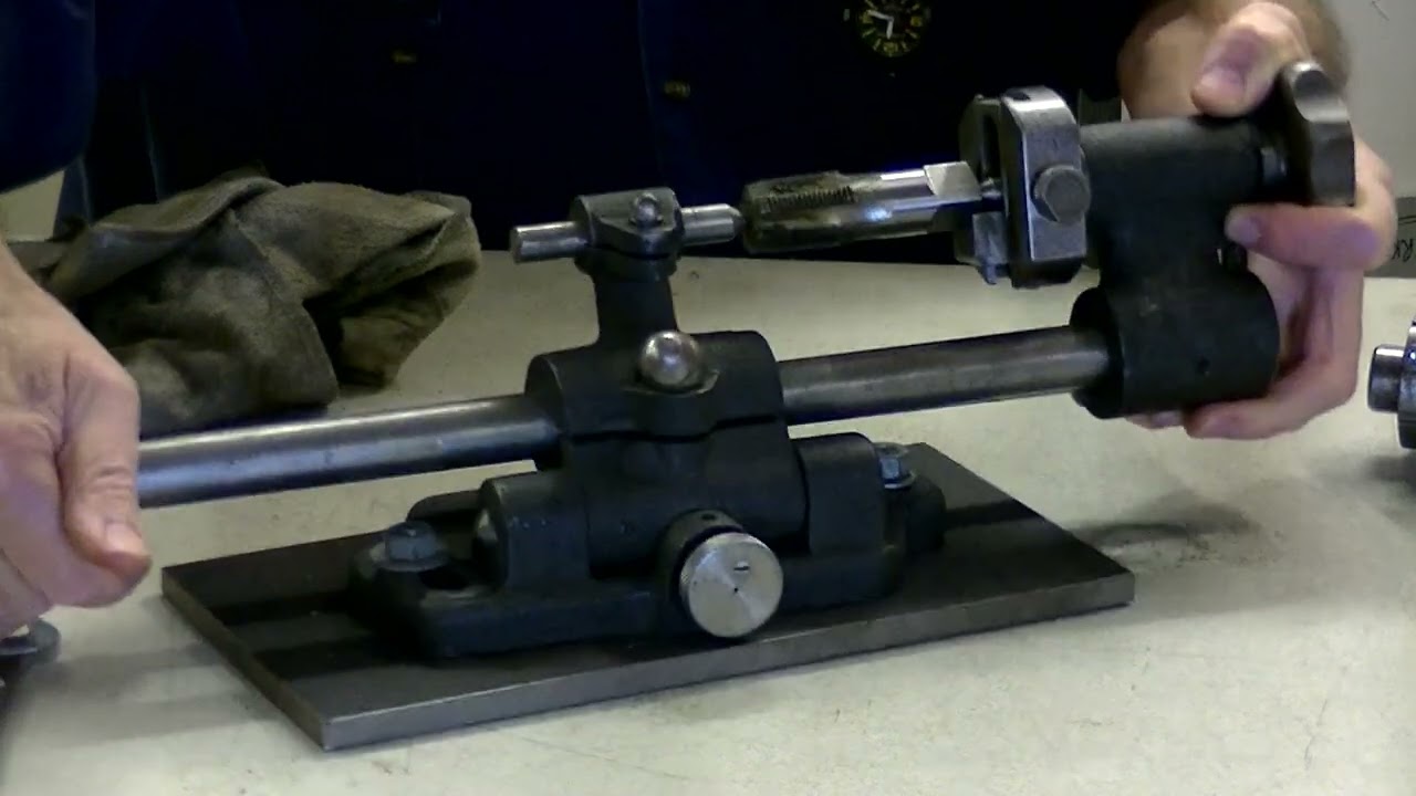 Tap grinder and axial relief attachment