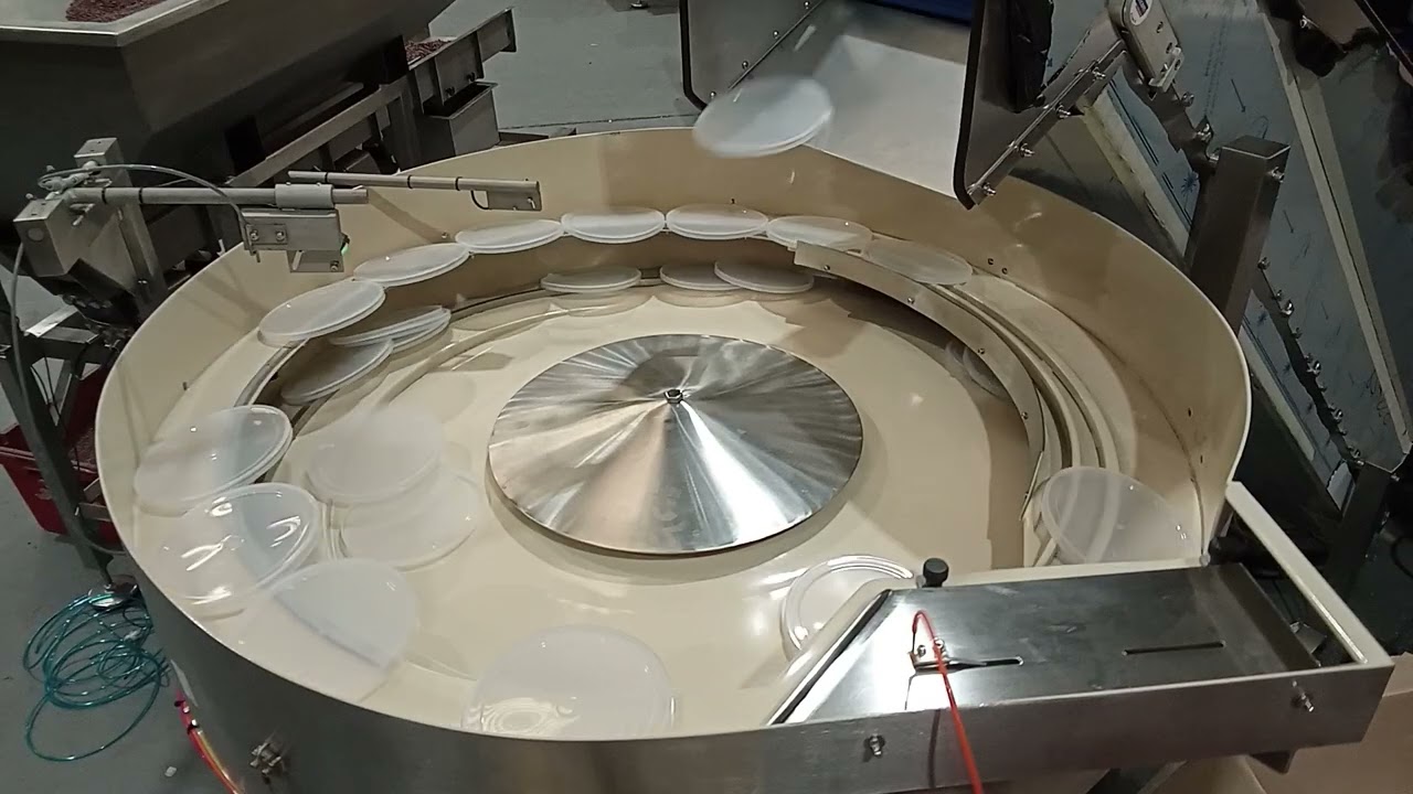 AUTOMATED LID SORTING AND ORIENTATION