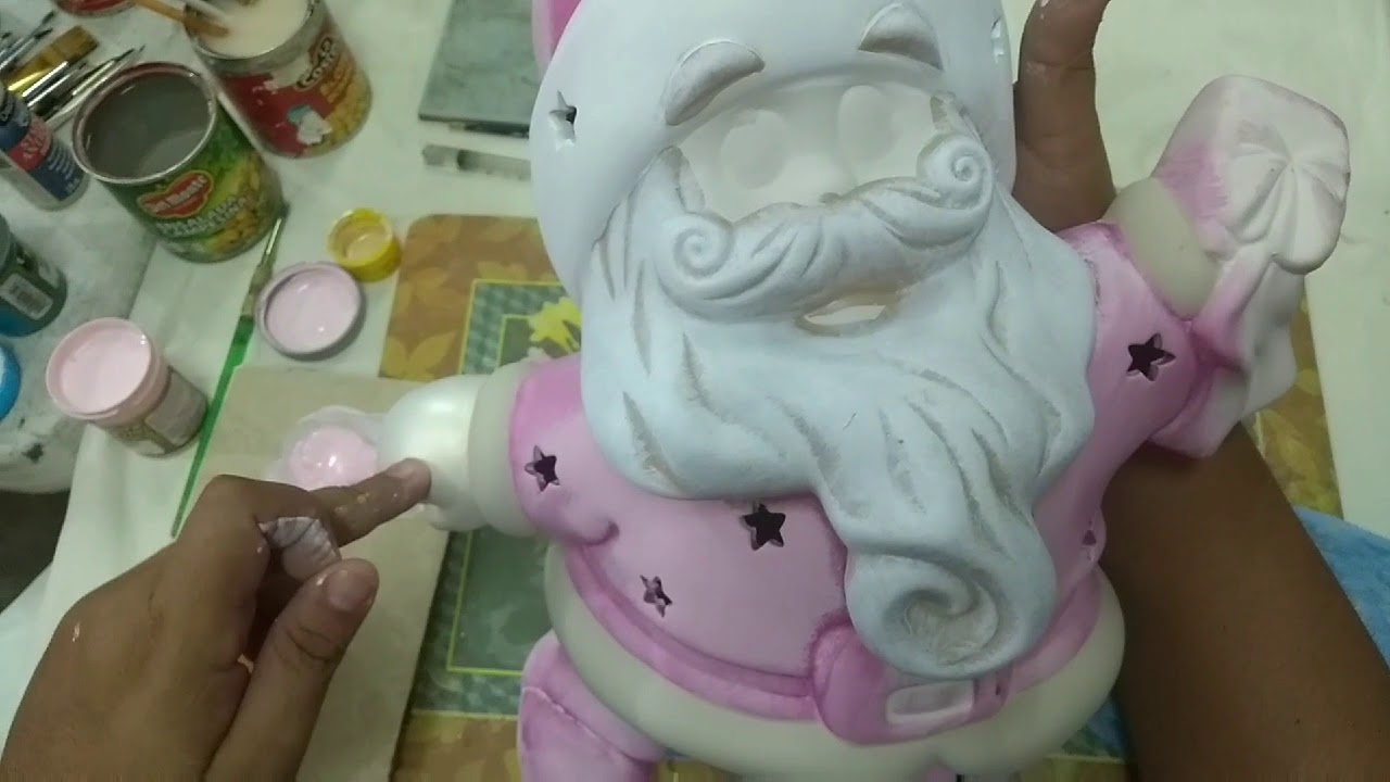 SANTA CLAUS DE CERAMICA EN ROSA.