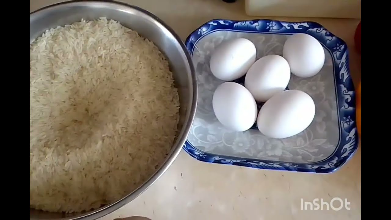 Arroz blanco con berenjena guisada y habichuela negra