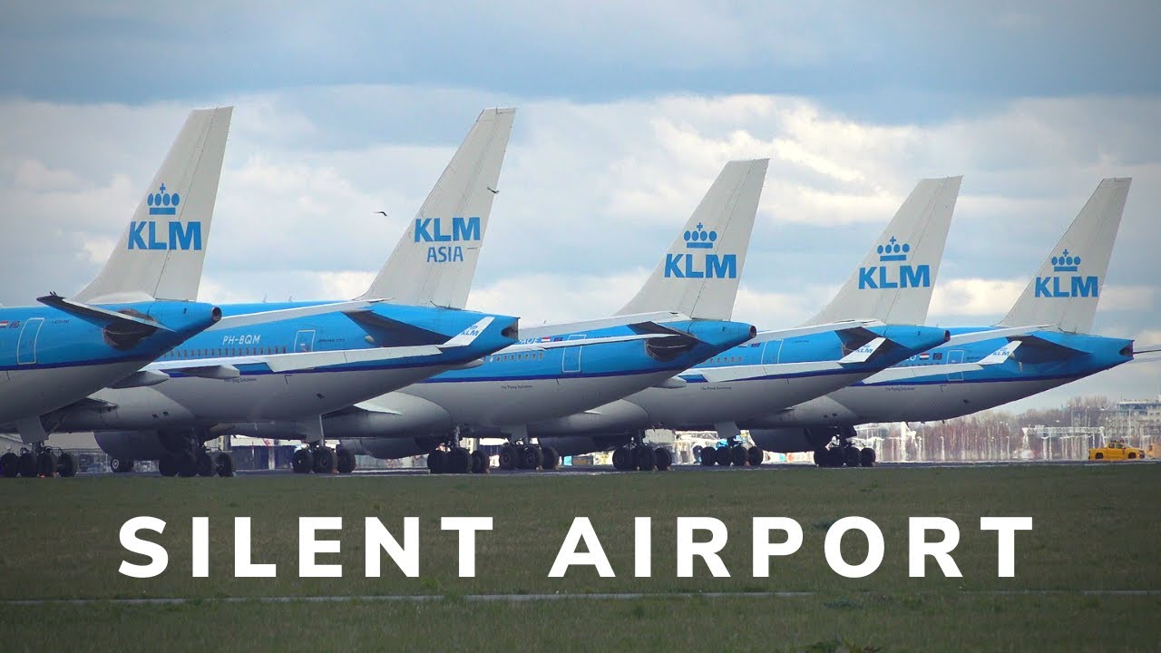 Schiphol Airport - Empty Departure Halls and Grounded KLM Aircraft on Runway (Coronavirus Covid-19)