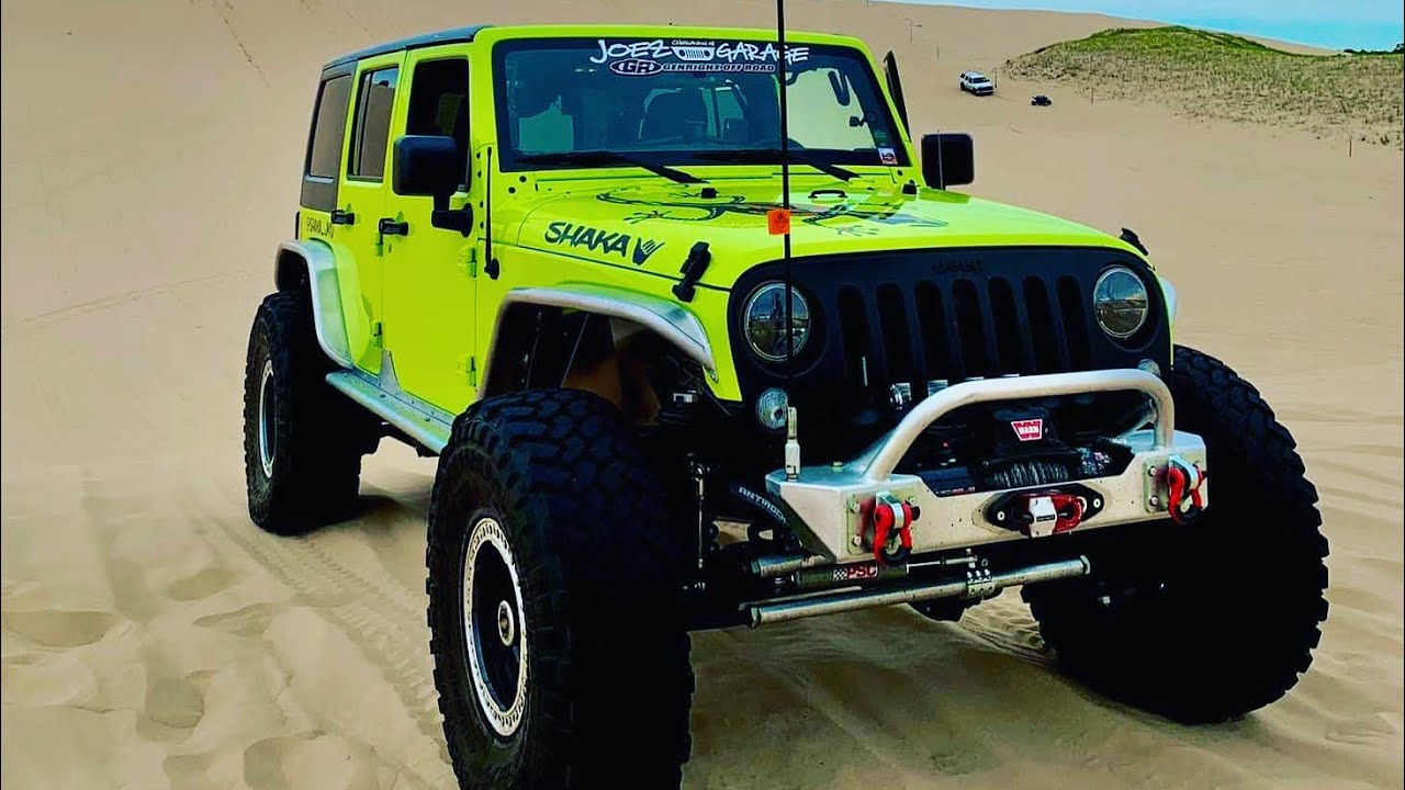 Jeep Jku on ProRock 60’s and 40’s TeraFlex￼ long arms GenRight bumper,fender flares.Joe’z Garage￼