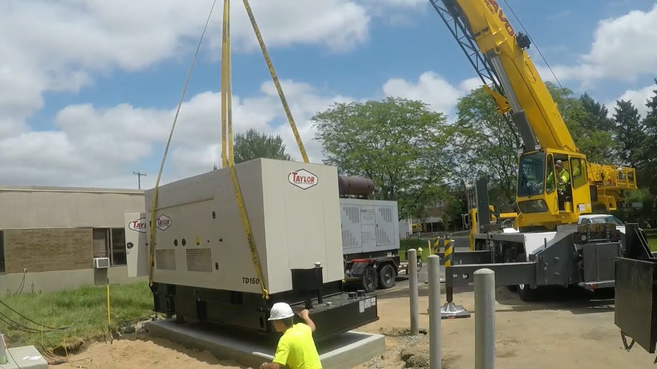 Grove 70 Ton Crane Setting a 150KW Generator