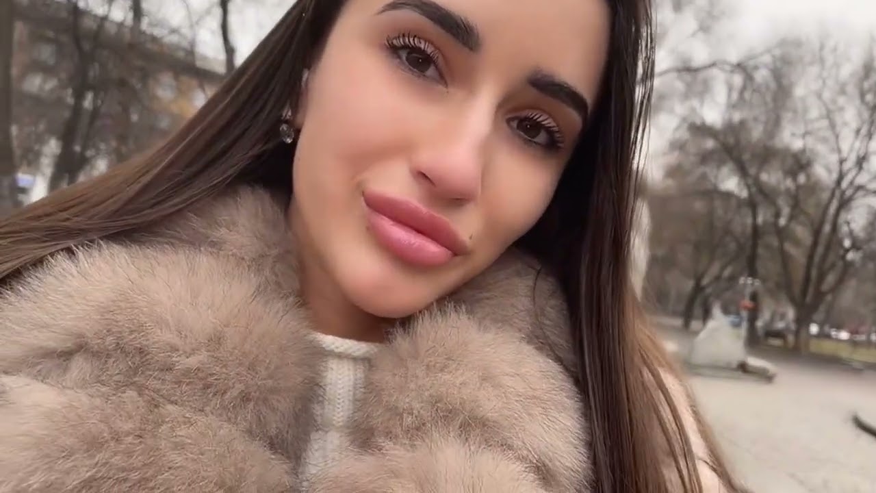 When a Beautiful Woman in Fur Coats Feels Happiness