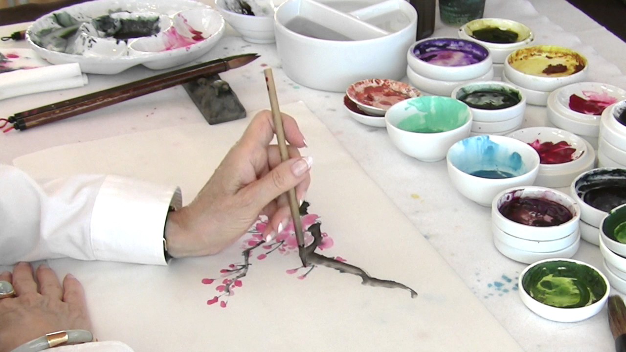 Nan Rae Painting Cherry Blossoms and Butterfly