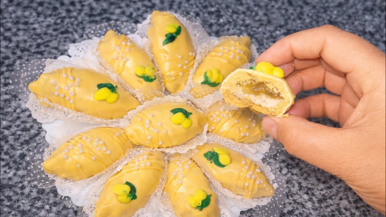  حلويات العيد، ديليس الليمون المنعش بحشو جوز الهند حلوة راقية واقتصادية ناجحة 100٪