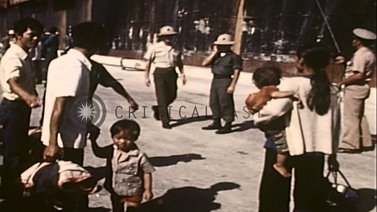 Vietnamese refugees arrive in Guam aboard the SS Transcolorado, during Operation ...HD Stock Footage