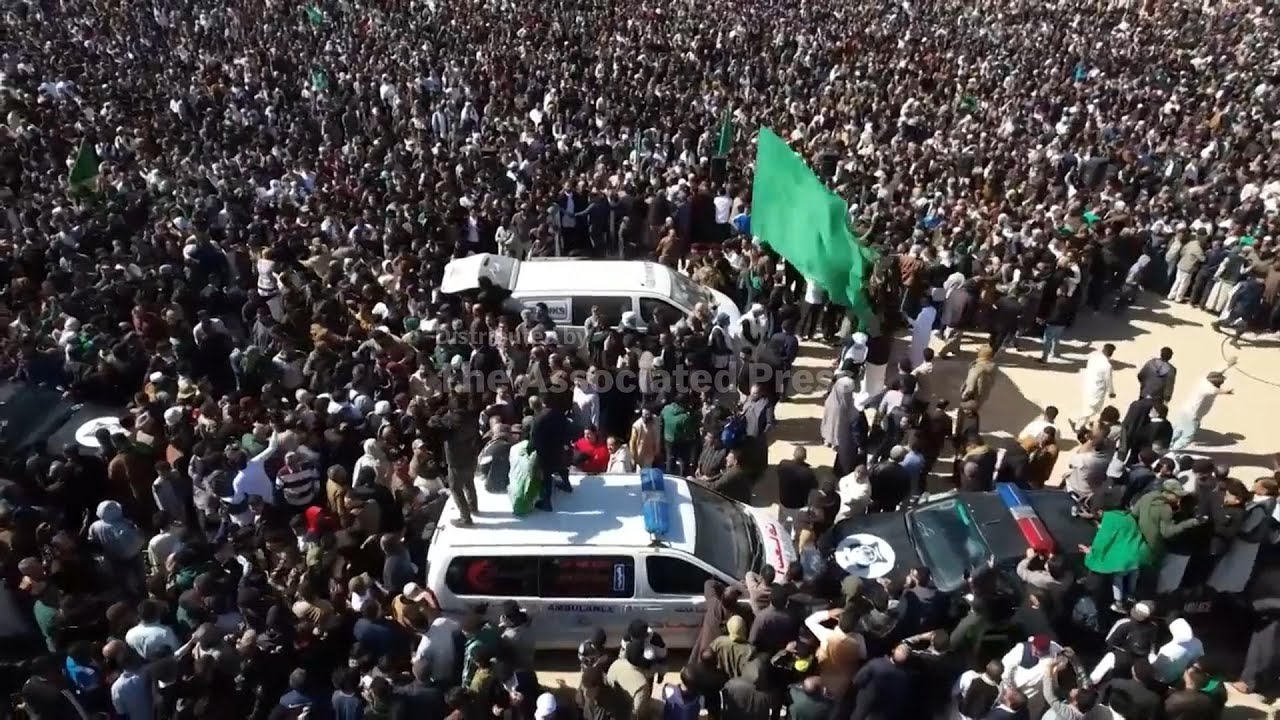 Thousands of Libyans gather for the funeral of Gadhafi’s son who was shot and killed this week