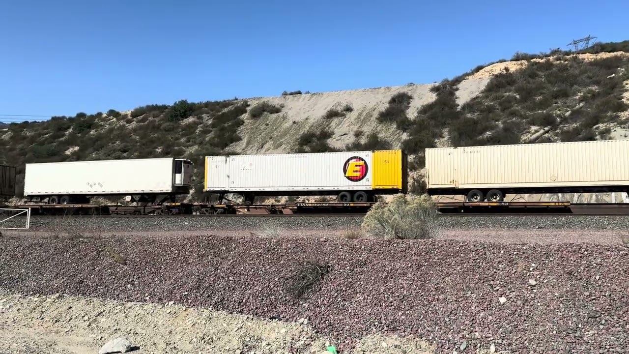 BNSF 8288 Leads Eastbound Intermodal Train Rolling Through Blue Cut CA.