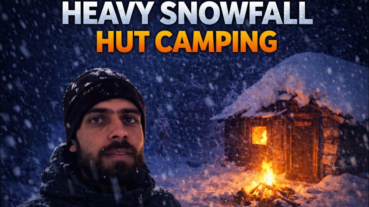 heavy snowfall night hut camping