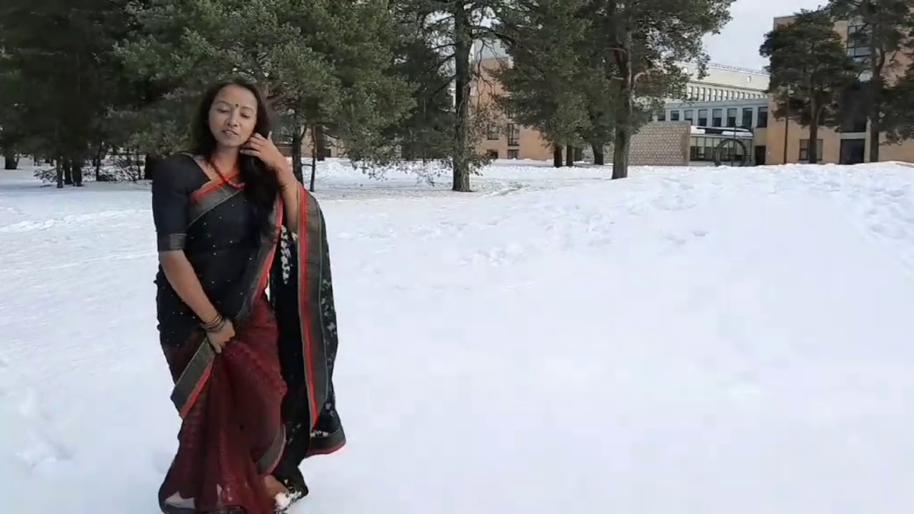 Walk in freezing cold snow with saree