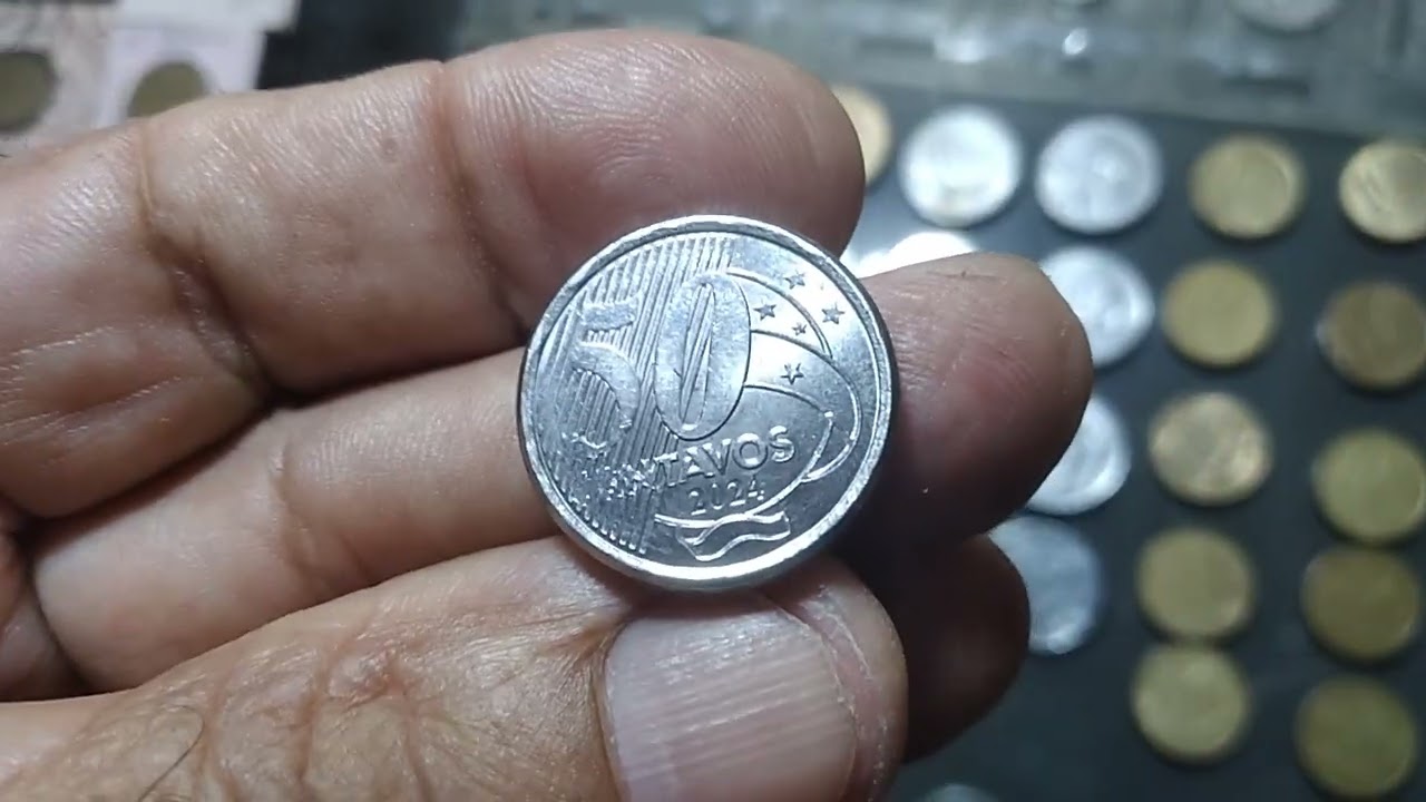 Esta sim tem valor moeda de 50 centavos com revesso do ano de 2024