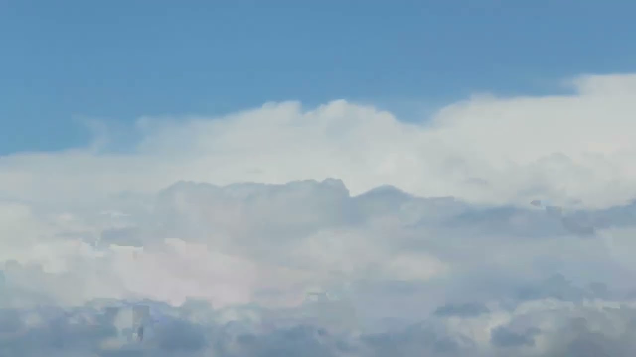 Cumulonimbus calvus clouds in the afternoon - March 23, 2024