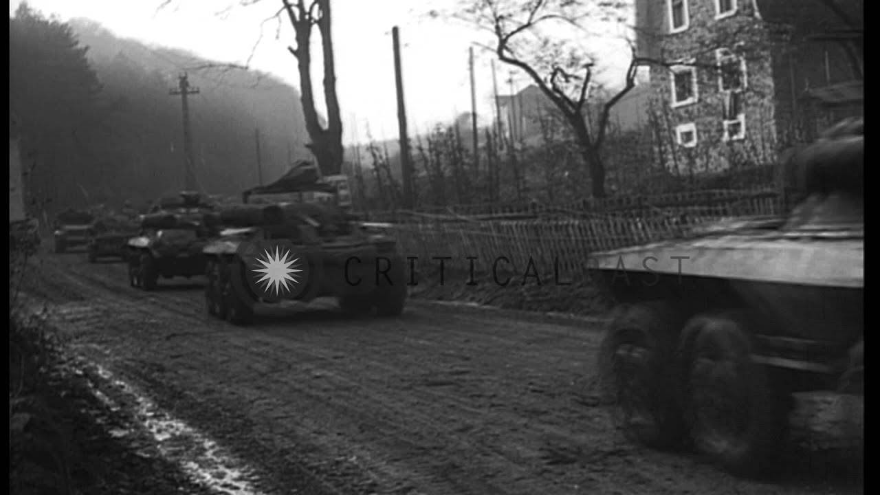 United States 3rd Armored Division vehicles drive towards Mosbach in Germany. HD Stock Footage