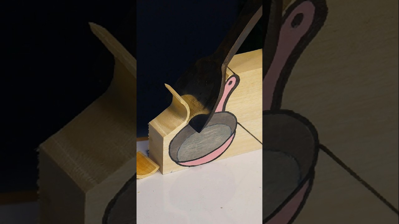 Carving a pan from wood 