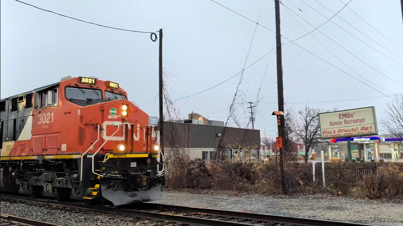 Rainy morning CN Manifest in East Lansing, MI