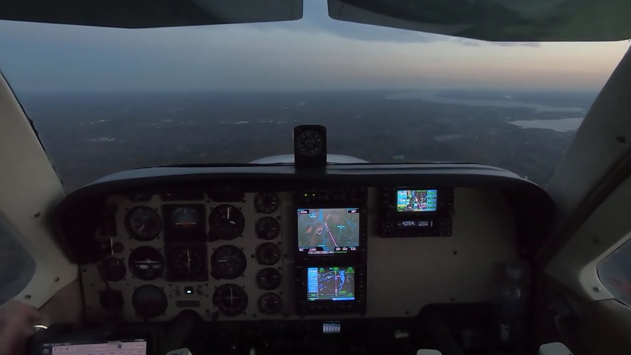 Dusk Landing Westchester New York in the Beech Bonanza