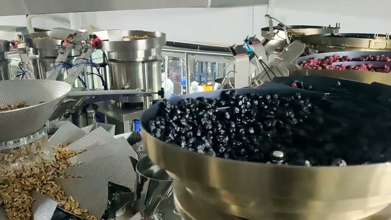 Nuts mix packiang system with multihead weigher and packaging machine