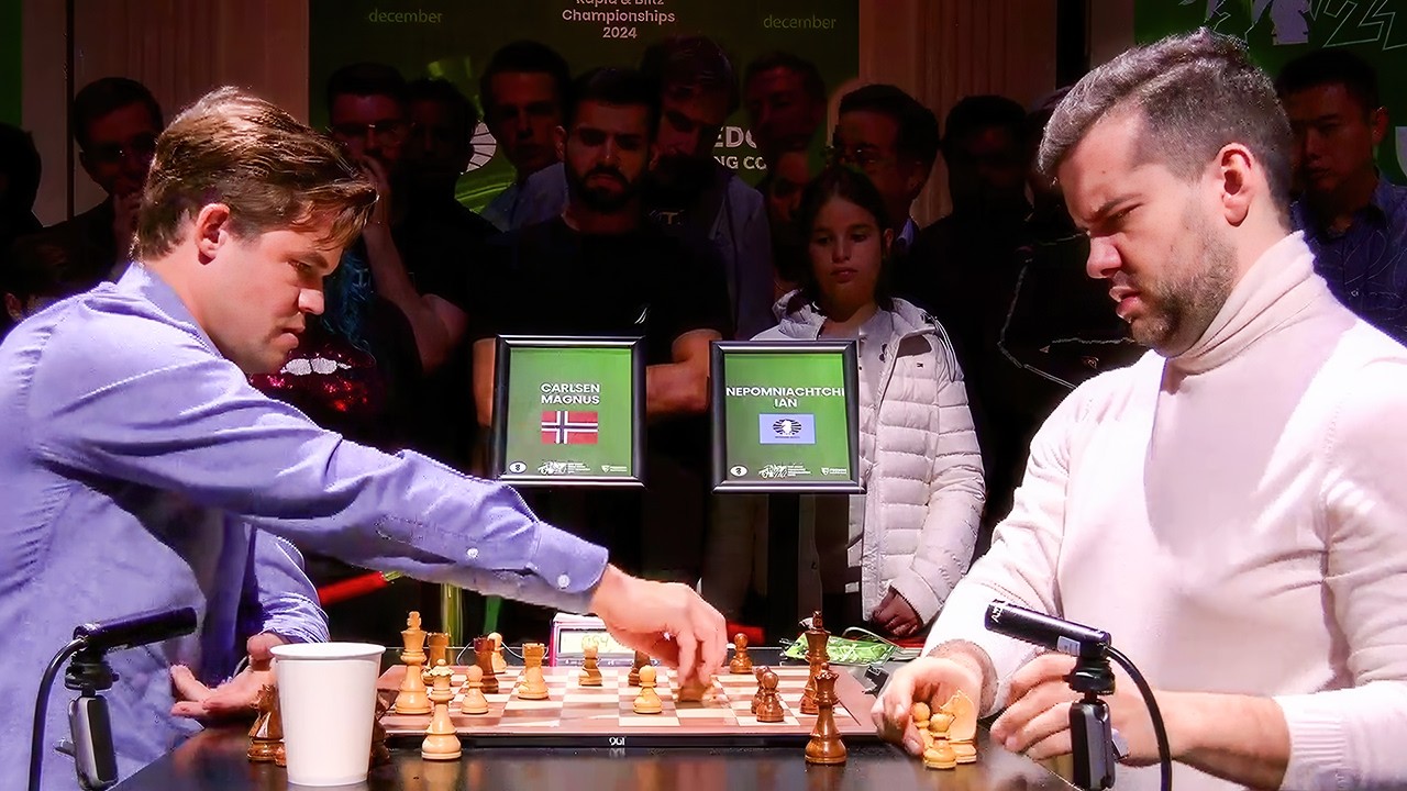 NEPOMNIACHTCHI AND CARLSEN BATTLE TO THE END IN WILD BLITZ GAME