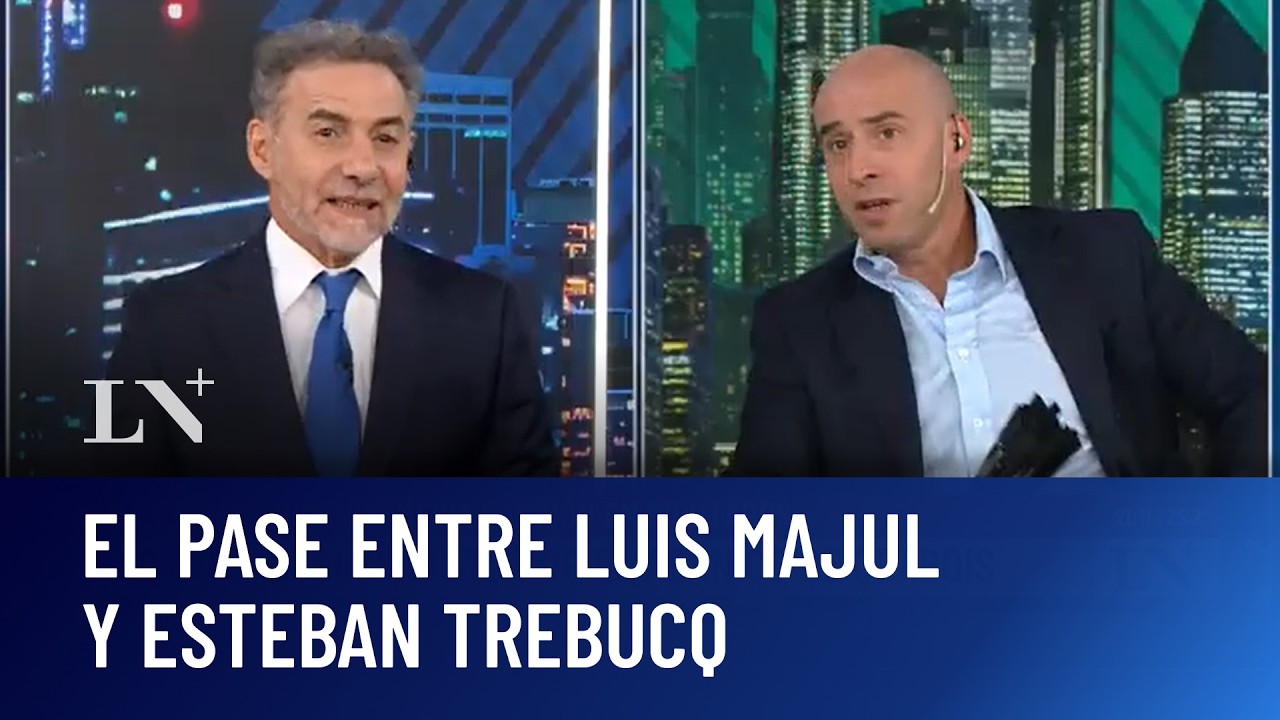 Juan Grabois, abanicado en plena marcha. Luis Majul con Esteban Trebucq