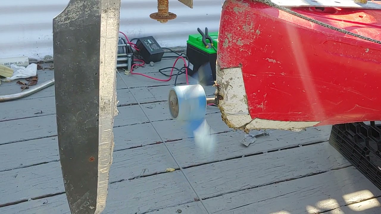 Homemade motorized kayak.
