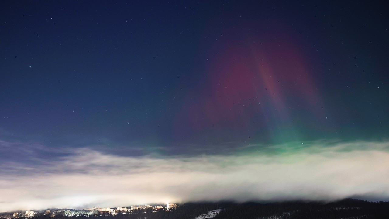 Timelapse - 2026 02 14 - Aurora appears over a northern town on a midwinter night