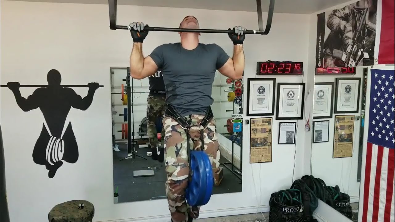 100 pullups with 72lbs in 49 minutes 301 total lbs