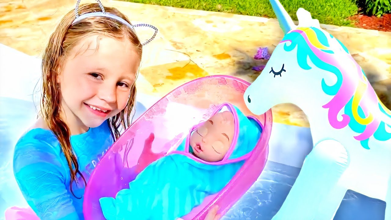 Nastya y pap&aacute; juegan con juguetes inflables gigantes