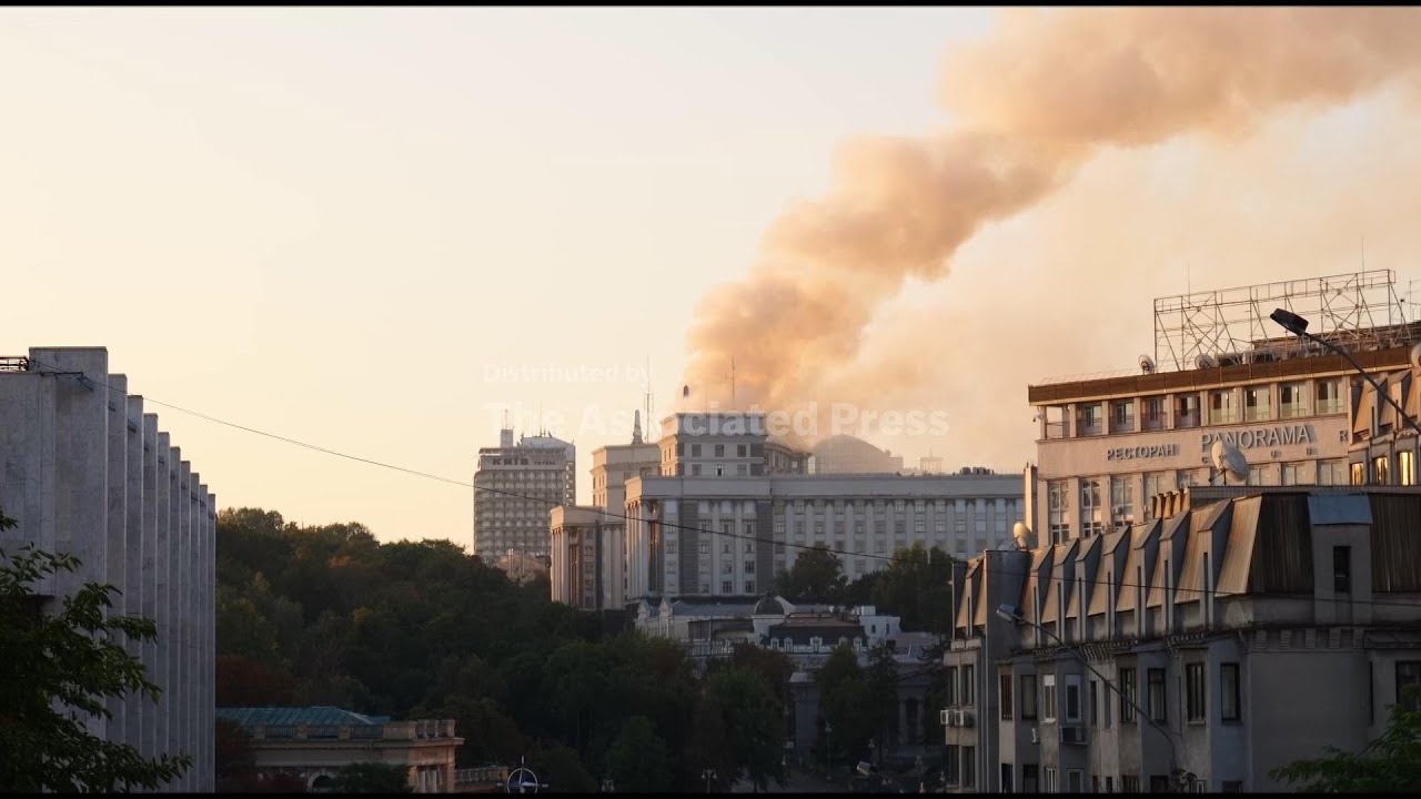 Smoke rises from roof of a key government building after mass Russian attack on Kyiv