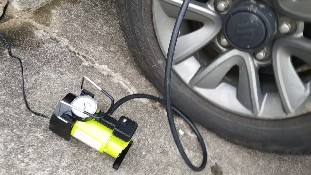 Teste de compressor  de ar port&aacute;til 12V testado em pneu Pirelli Scorpion ATR 205 70 15