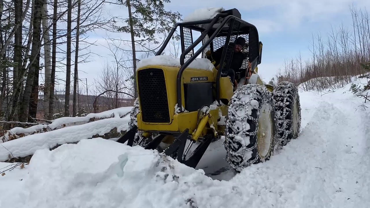 John Deere 440 Skidder - Plowing Snow
