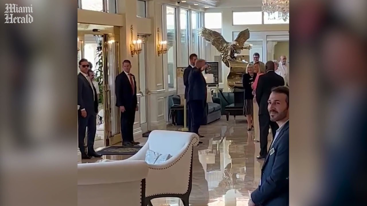 Former President Trump walks into Trump National Doral ahead of Tuesday's federal court appearance
