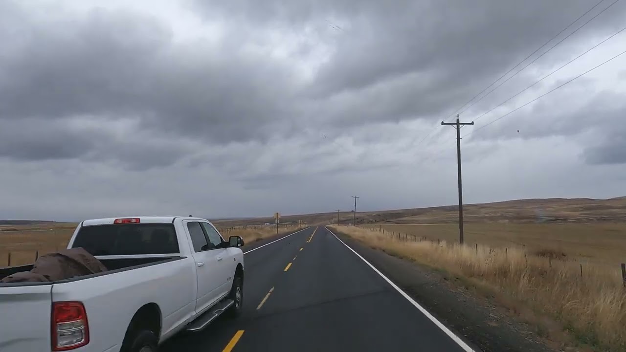 Explaining big skies on a rainy day's drive.#bigskycountry #bigskies