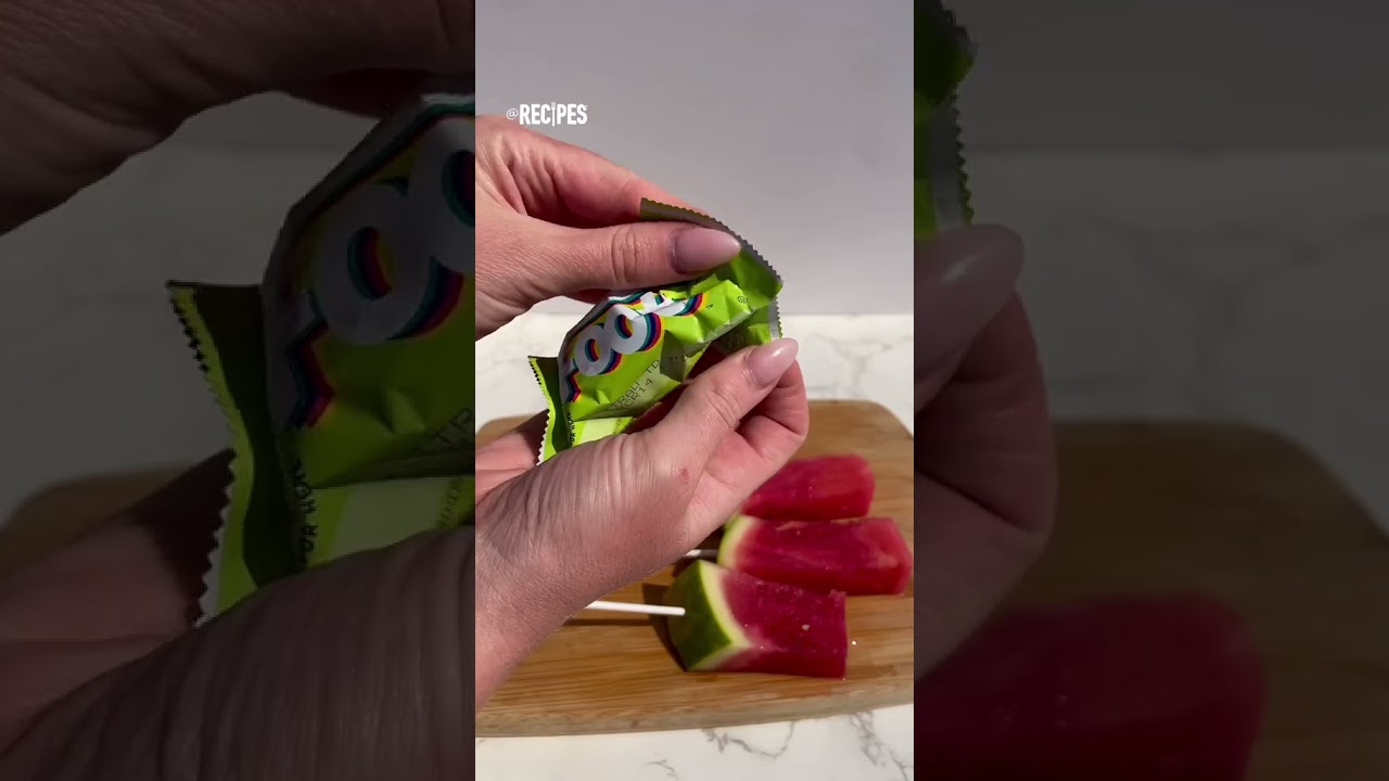 VIRAL Fruit Roll Up Wrapped Watermelon with Tajin + Chamoy! #fruitrollup #watermelon #viral